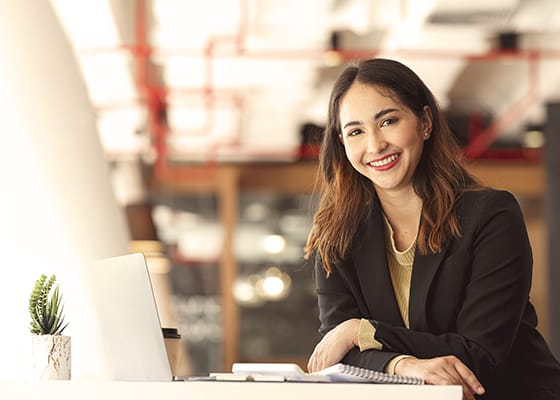 Young asian beautiful and charming busineswoman smiling and work - Seahawk Header