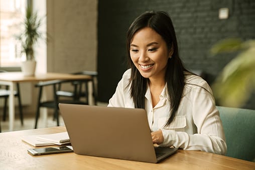 Happy young asian business woman - Seahawk