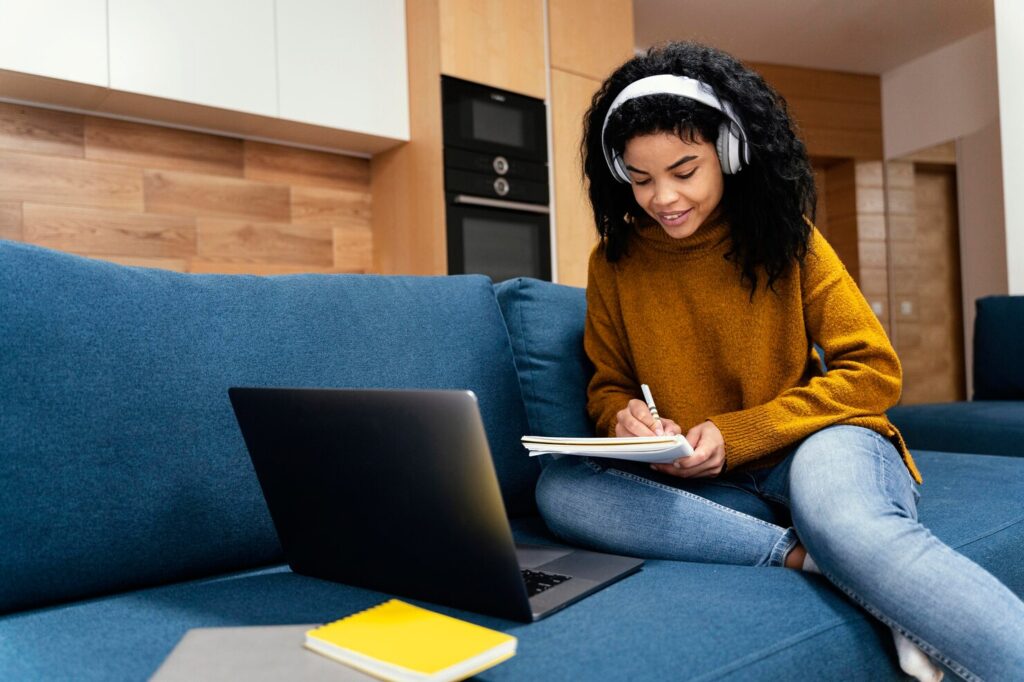 teenage-girl-with-laptop-headphones-online-school_23-2148827452 - Seahawk Online-courses